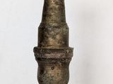 a small metal object that is sitting on a table
