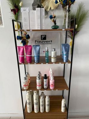 a shelf that has many different types of skin care products on it