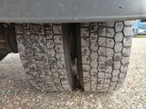 a close up view of a tire on a truck