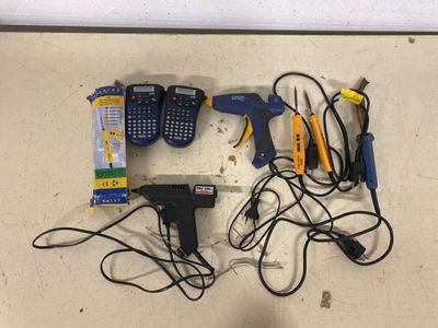 a lot of tools that are laying out on the floor
