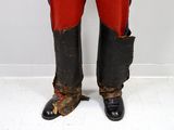 a close up of a pair of boots that are worn by a soldier