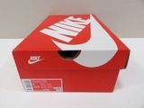 a red box that has a white nike logo on it