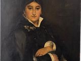 portrait of a woman in a black dress with a white collar