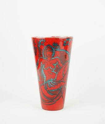 an image of a red glass with a picture of a woman on it