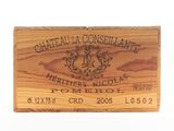 a wooden box with a label on it that says chateau la consellant