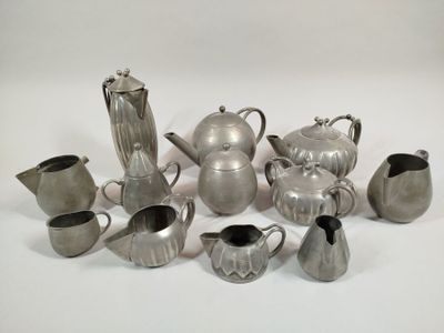 a lot of silver items that are on the table