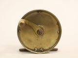 a small metal object that is on a white surface