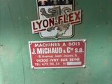 a green box with a sign on it that says lyon flex