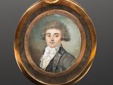 un portrait miniature ovale représentant un homme en manteau noir