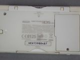 a close up of a white nintendo ds game console