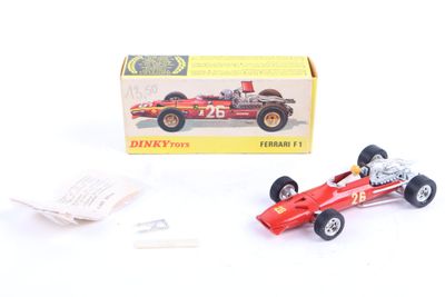 a red toy race car with a box on the side