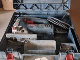 a tool case with tools in it sitting on a table