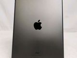 an apple ipad sitting on top of a table next to a white background