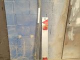 a baseball bat leaning up against a wall in a room