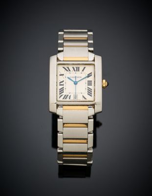a close up of a wrist watch with roman numerals on it