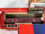 a box with a train car in it and a box with a train car in it