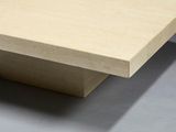a close up view of a table with a square top