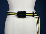 a mannequin torso with a yellow and black belt