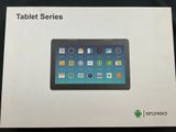 a box with a tablet on it sitting on top of a table