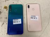 l'arrière et le côté d'un téléphone rose et d'un autre bleu, placés l'un à côté de l'autre