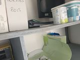 a shelf that has a bunch of items on it