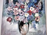 une peinture de fleurs dans un vase sur un chevalet