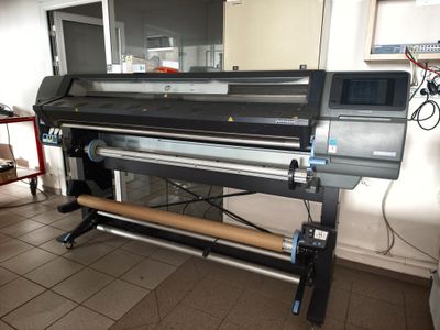 an image of a large digital printer in a room