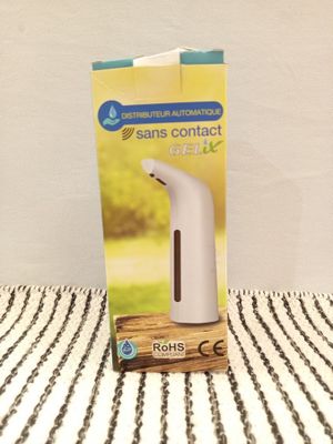 a box of soap dispenser sitting on top of a table