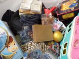 a pile of toys and other items that are in a bin