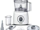 a white food processor with a blender and other kitchen items