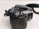 an image of a camera with a strap attached to it