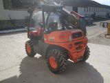 a picture of a forklift truck parked on the side of the road
