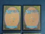 two decks of magic the gathering deck are shown on a table