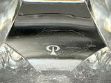 a close up of a car ' s front bumper with a logo on it