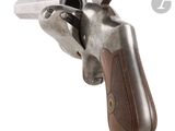 a gun with a wooden handle on a white background