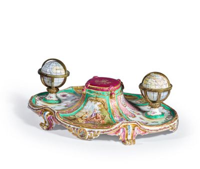 a small table with a globe on top of it