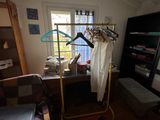 an image of a bedroom with a bunk bed and a desk