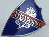 a close up of a badge on a white surface