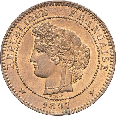 gros plan d'une pièce de monnaie sur laquelle figure une tête de femme