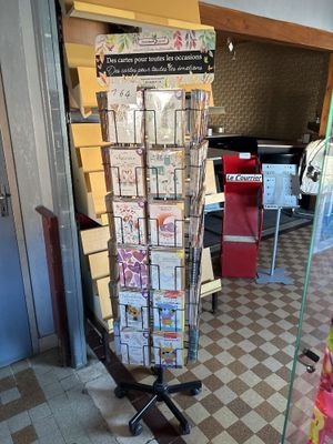a picture of a store with a lot of magazines on the floor