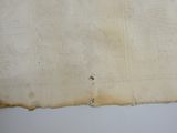 un bout de papier qui a été laissé sur le mur