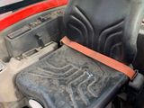 a seat in the back of a truck with a seat belt