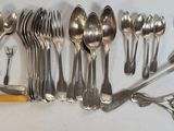 a lot of spoons and spoon spoons on the table