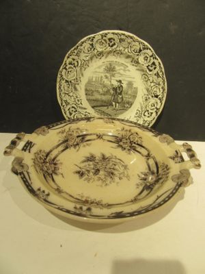a plate and a bowl sitting on a table