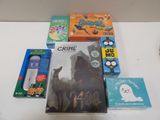 a lot of books and games on the table