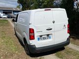 a white van parked on the side of the road