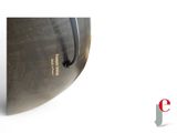 an image of a large metal pan on a white surface