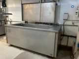 an image of a commercial kitchen with stainless steel appliances