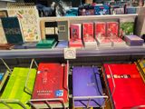 a lot of books on the shelves in the store