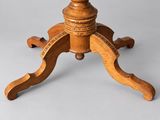 a close up of a wooden table on a grey background